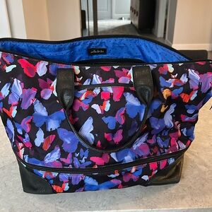 Like new. Stella & Dot expandable weekend bag.